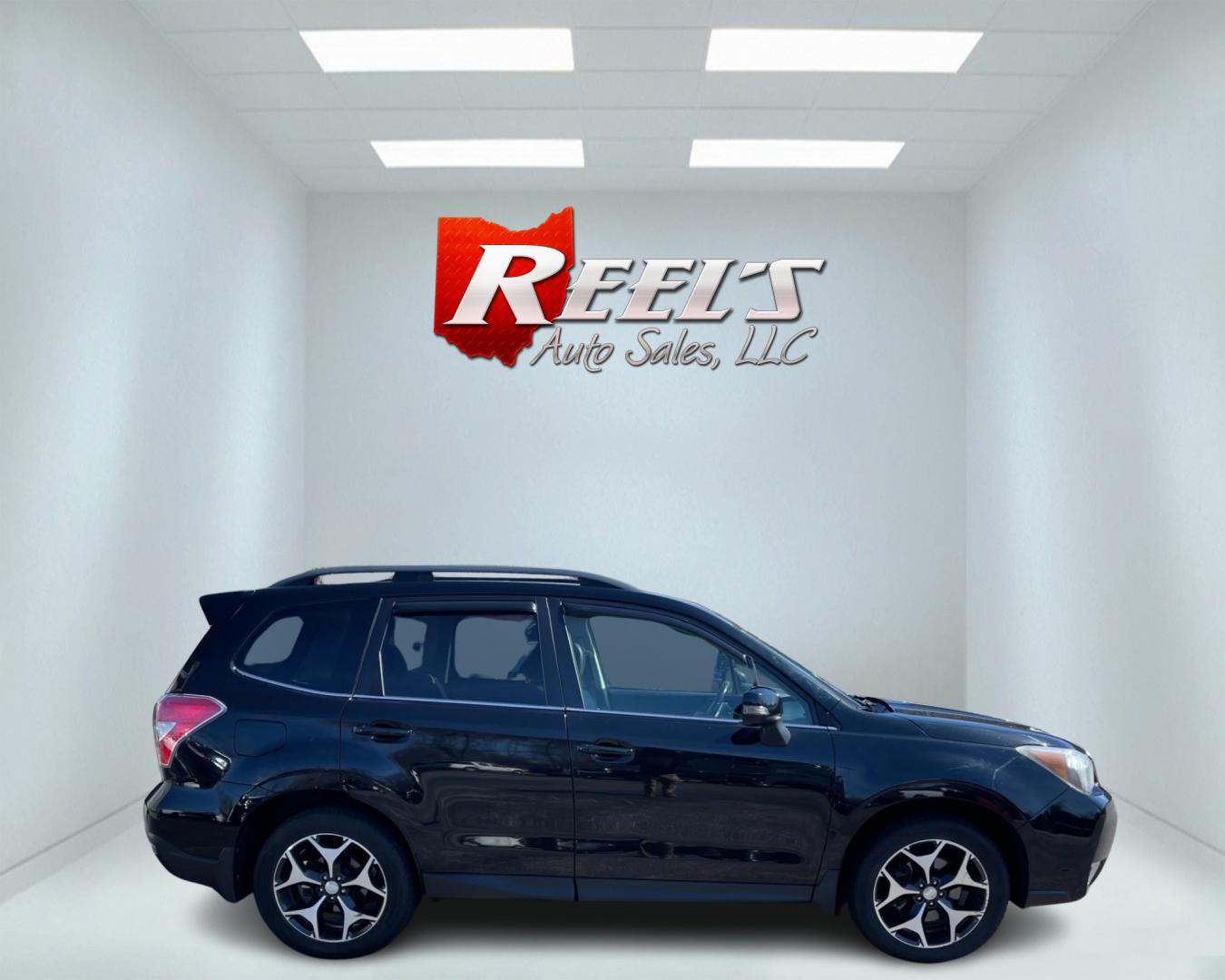 2014 Black /Black Subaru Forester 2.0XT Touring (JF2SJGMC4EH) with an 2.0L H4 SOHC 16V TURBO engine, Automatic transmission, located at 547 E. Main St., Orwell, OH, 44076, (440) 437-5893, 41.535435, -80.847855 - Photo#4